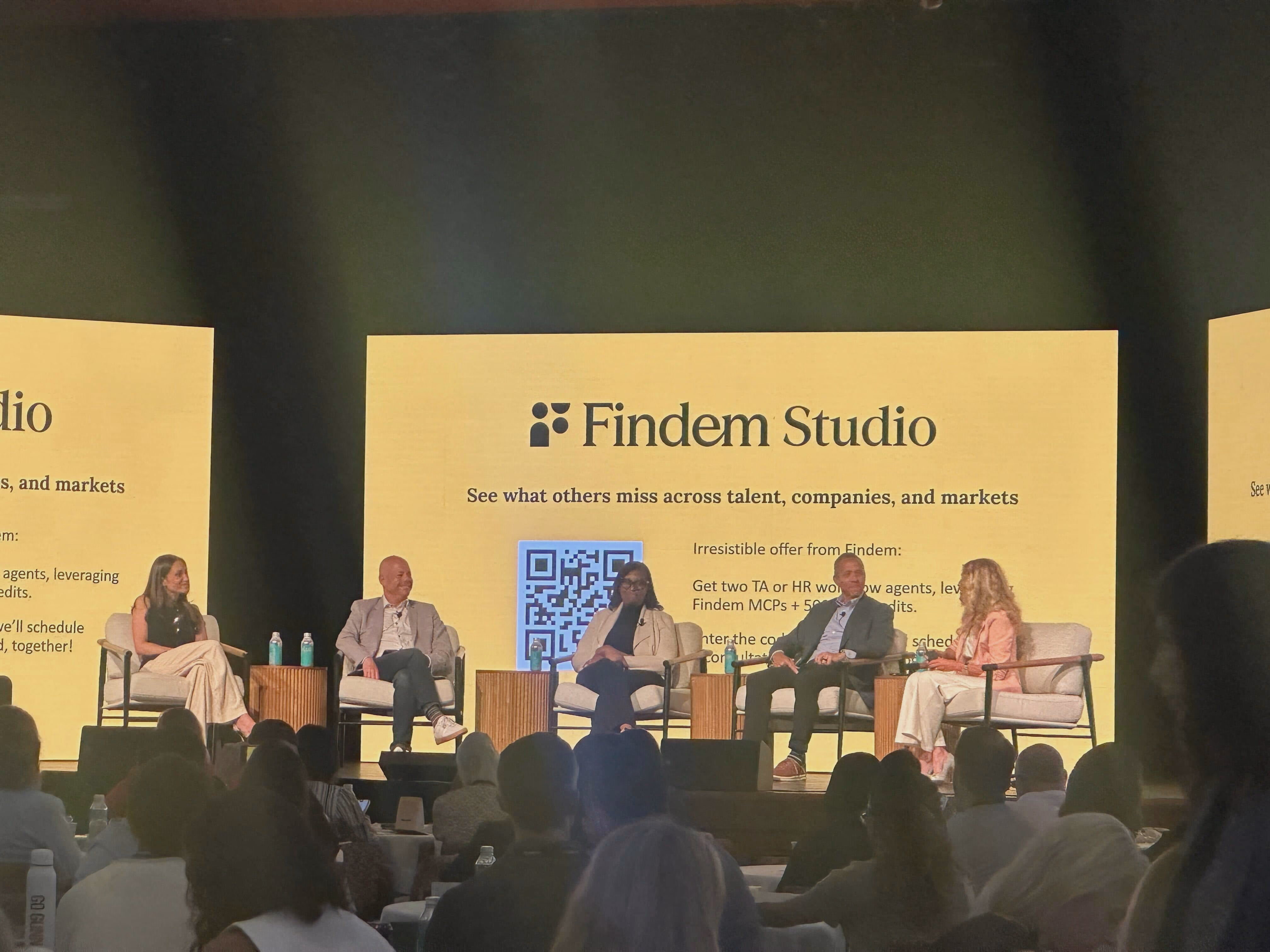 Findem panel on stage at Irresistible 2026 in front of a Findem Studio backdrop.